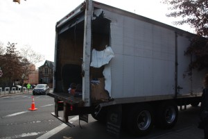 The white delivery truck that got caught on the Parks truck and pulled it over had some significant damage.